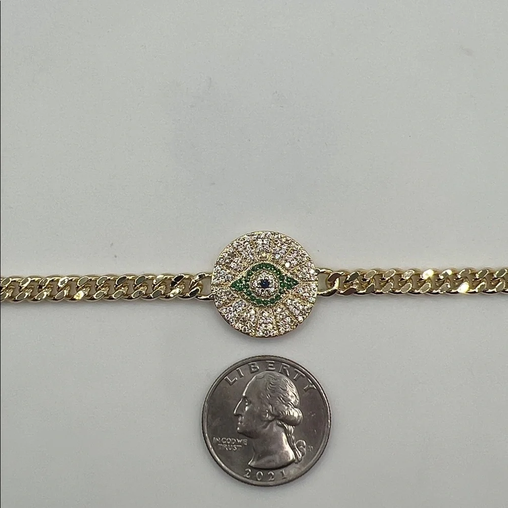045. 18k Gold Plated Evil Eye Bracelet with green accents 7 1/4”